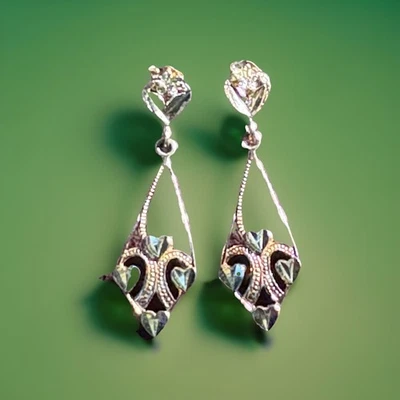 � Oro 14 quilates diseño de corazón muy delicado con algún tono de oro rosa  Foto 1 de 4