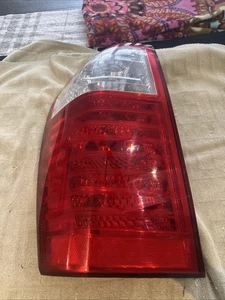 2008  KIA SEDONA DRIVER LEFT HAND SIDE TAILLIGHT OEM W/ SMALL SCUFF - Picture 1 of 6