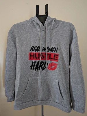 Unbranded women's size large Gray pull over  "real women Hustle hard" sweater  - Image 1 of 4