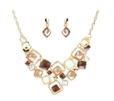 Conjunto de collar babero beige y marrón en tono dorado 16 pulgadas con extensor Foto 1 de 3