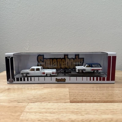 2025 M2 Machines 1976 GMC Sierra 3500 & 1975 Auto Hauler SQUAREBODY SYNDICATE - Image 1 of 4