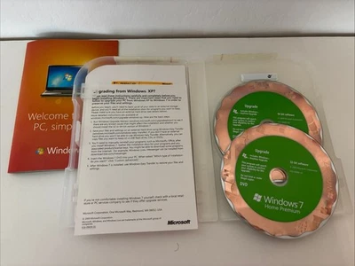 Microsoft Windows 7 Home Premium Upgrade 32 Bit & 64 Bit DVDs Complete w/ Key - Image 1 of 4