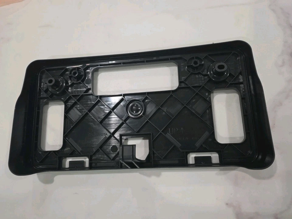 Soporte delantero para matrícula Toyota Camry SE XSE 2025-2027 75101-AQ020 OEM Foto 1 de 4