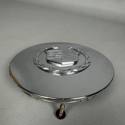 Хромированный центральный колпак колеса Cadillac Deville DTS с поднятой эмблемой 9593259 от оригинального производителя - Изображение 1 из 4