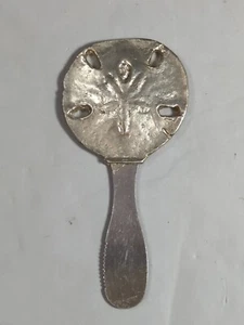 Cuchillo esparcidor peltre arena dólar queso mantequilla mermelada paté de colección The Kings estaño - Imagen 1 de 4