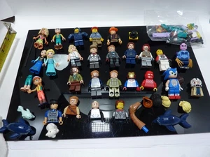 Lote de minifiguras Lego - 27 + minifiguras + accesorios - temas mixtos - Imagen 1 de 6