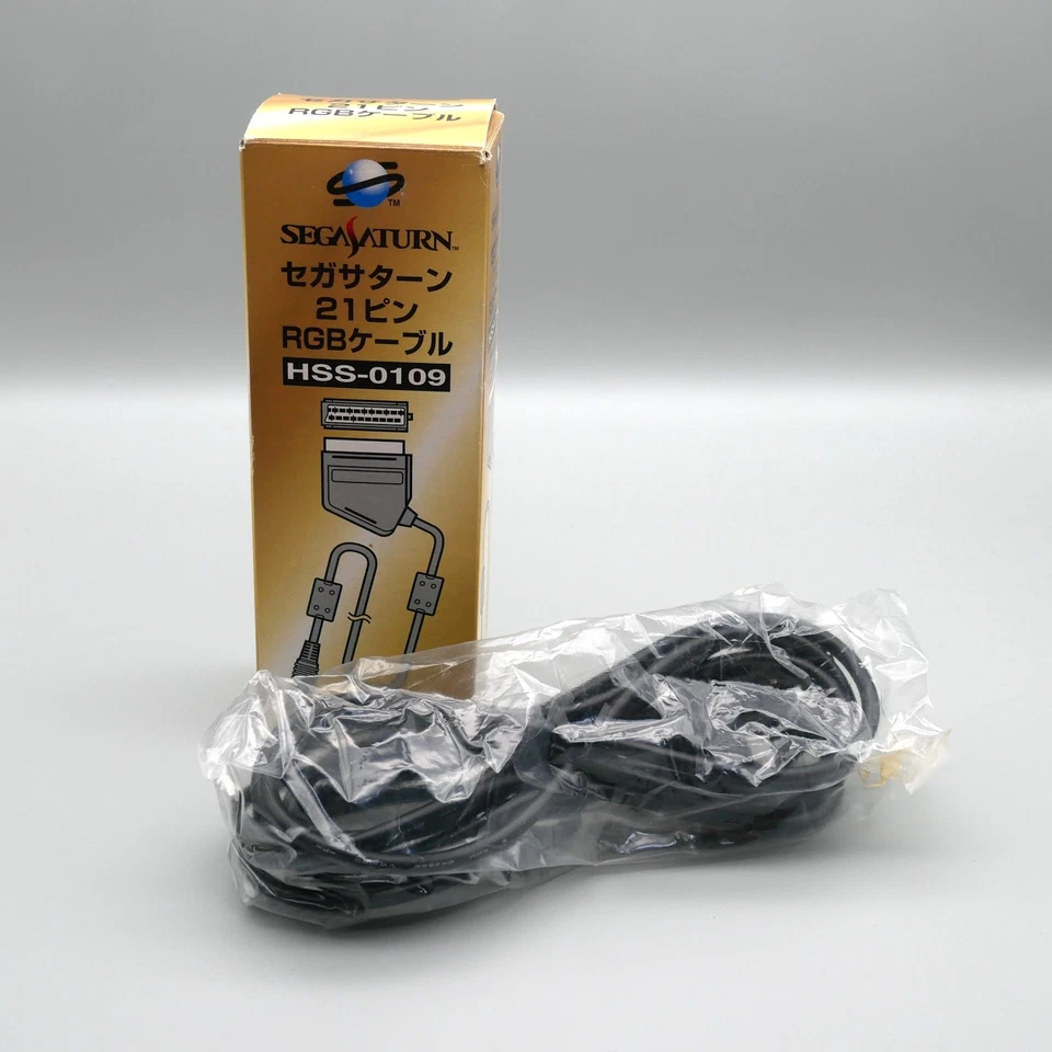 [ SAT ] OPEN BOX - OFFICIAL SEGA 21-PIN RGB CABLE - Saturn JAPAN SCART - Image 1 of 4