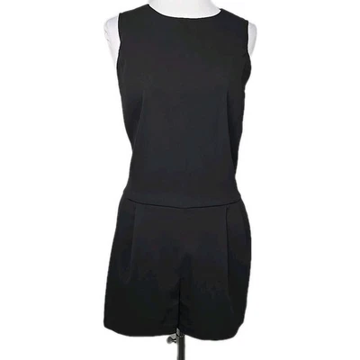 Mono corto Michael Kors negro sin mangas plisado mameluco talla 4 Foto 1 de 4