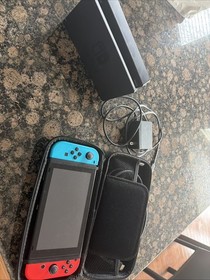 Nintendo Switch with Neon Blue and Red Joy-Cons, Dock, Charger and Accessories