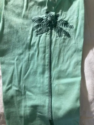 JEANS ALGODÓN COLOR AQUA/MENTA TALLA 28 CON PALMERAS BORDADAS ARRIBA Y ABAJO PIERNAS Foto 1 de 4