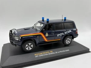 Altaya '05 Nissan Patrol GR "DIRECTION GENERAL POLICIA" in blu 1/43 IMBALLO ORIGINALE -raro - Foto 1 di 6
