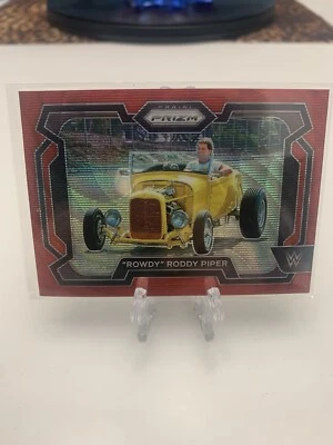 2024 WWE Panini Prizm "Rowdy" Roddy Piper Ruby Red Wave Prizm #57 - Image 1 of 2