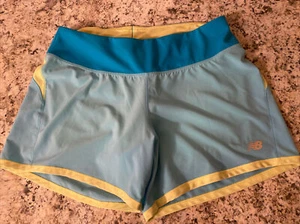 Pantaloncini da corsa/nuoto donna New Balance (medi) forma A+  - Foto 1 di 8