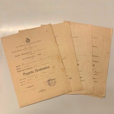 C034 - Lotto di 4 pagelle scolastiche - dal 1927 al 1931