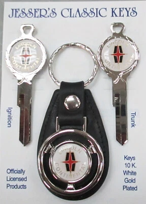 Llaves clásicas de lujo Lincoln Continental blancas con oro oro blanco 1962 1963 1964  Foto 1 de 4