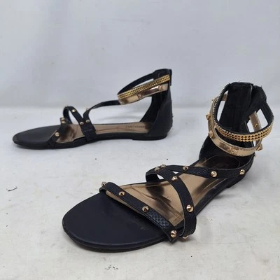 Jennifer Lopez 黑色金色铆钉踝袖口角斗士凉鞋摩托车前卫 8.5 码 — 第 1/3 张图片
