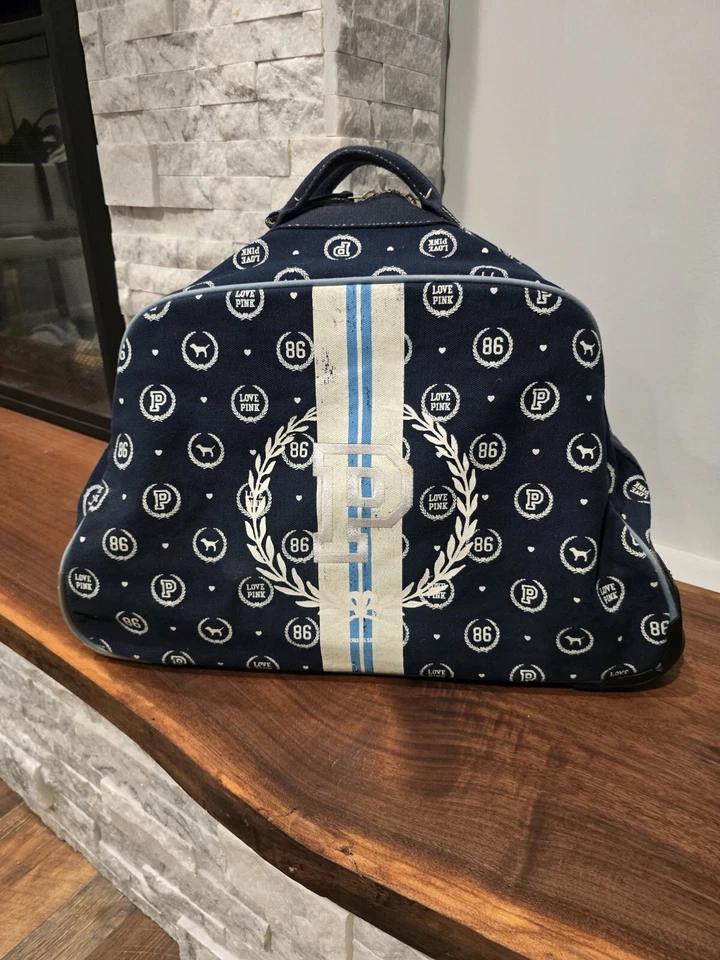 Victoria Secret ROSA Maleta de Traje Equipaje con Ruedas Bolso de Lona RARO Foto 1 de 4