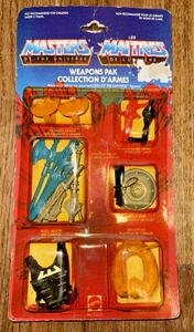 BILINGUAL MASTERS OF THE UNIVERSE CARDED WEAPONS PACK 1983 - Picture 1 of 2