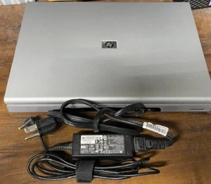 HP Pavilion dv1000 14.1". 1.5 GHz Pentium M 480 MB Ram. 80 GB HD Windows XP - Picture 1 of 18