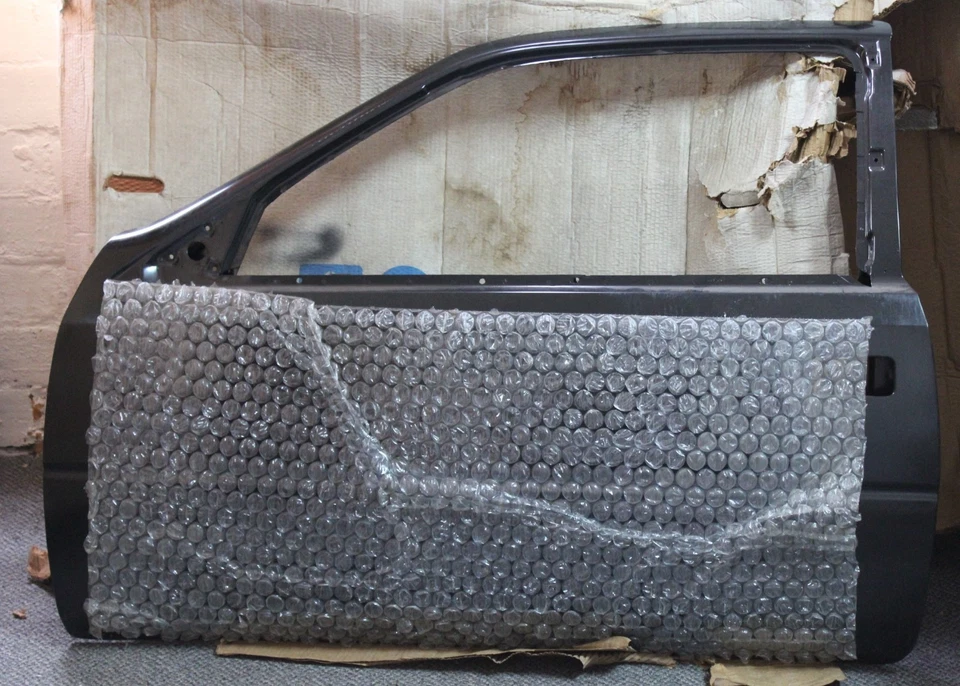 Novo Estoque Antigo OEM Mopar Porta Esquerda 4549105 1990-1993 Chrysler LeBaron Coupe - Imagem 1 de 4