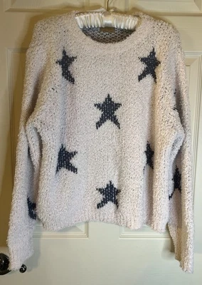 Suéter difuso rosa pálido estrellas azules cuello redondo suave talla M POL para mujer Foto 1 de 4