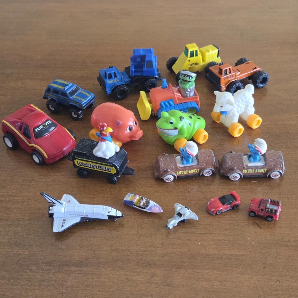 Винтажный Лот из 17 Игрушек 1980-90-е Тонка, Смурфики, Стомпер, ERTL, Улица Сезам и т.д. - Изображение 1 из 4