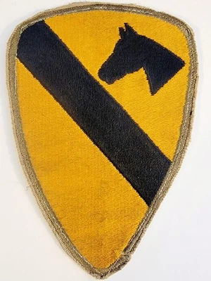 WWII 1st Cavalry Division Patch Cut Edge White Back Green Border in Top Loader - Image 1 of 4