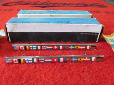1973-1977 Olds Cutlass Salon NOS GM Front Fender Flag Emblem Set # 231576 - Image 1 of 4