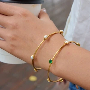 Bracciale donna placcato oro 18 kt con perle verdi zirconi antiappannamento - Foto 1 di 6