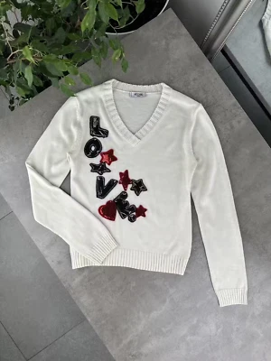 Suéter Moschino cuello en V para mujer talla S Foto 1 de 4