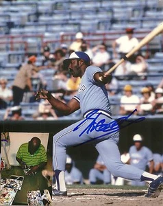 RICO CARTY TORONTO BLUE JAYS SIGNED AUTOGRAPHED 8x10 PHOTO W/COA SWINGING - Picture 1 of 1