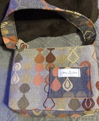 Cartera pequeña única hecha a mano Foto 1 de 4