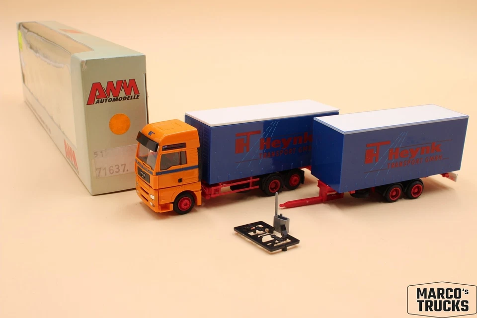 AWM MAN TGA XXL tandem drawbar truck "Heynk Rhede" 71637 1:87 /AW3015 - Image 1 of 1