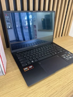 ASUS Zenbook 14 OLED UM3402YA 14.0"2.8K 90Hz OLED Laptop 16GB RAM 1TB Ryzen 5 - Immagine 1 di 4