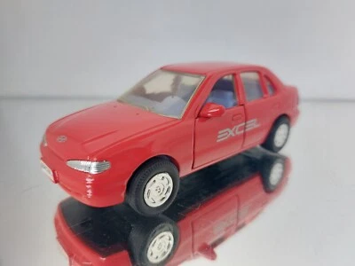 Hyundai accent Excel in rosso 1:35 Korea giocattolo a secco - Immagine 1 di 4