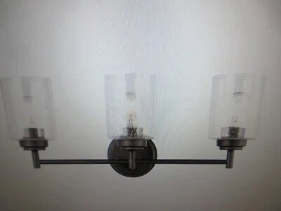 Kichler Winslow 21,5 pulgadas Lámpara de tocador de baño contemporánea de bronce antiguo de 3 luces Foto 1 de 4