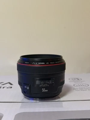 Lente profesional Canon EF 50 mm f/1,2 USM, limpia, usada Foto 1 de 4