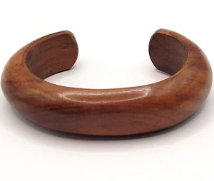 Bracciale in legno lucido tono medio belle linee vintage anni 80 - Foto 1 di 23