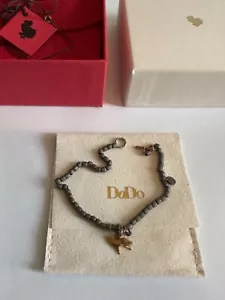 Dodo Pomellato braccialetto con ciondolo Cane Oro Giallo 18kt 750 e Titanio - Imagen 1 de 12