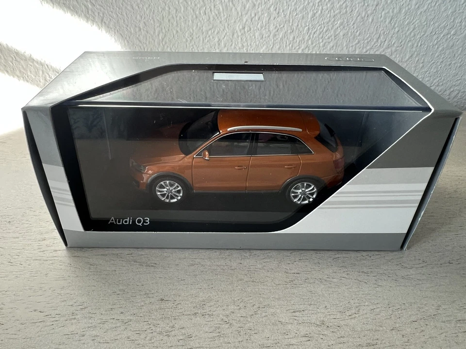 The Audi Collection Models 1:43.  Audi Q3.  Samoa Orange. NIB - Image 1 of 1