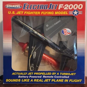 NEU Stanzel Toy Tethered Electrojet F-2000 U.S. Navy Kampfjet Flugmodell - Bild 1 von 19