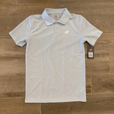 Polo atlético New Balance para niños talla X-grande (18-20) Foto 1 de 4