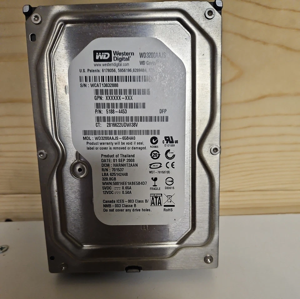 Western Digital WD3200AAJS - 65B4AO Foto 1 de 2