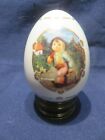Danury Mint M.J.Hummel Porcelain Egg The Merry Wanderer With Wood Holder Nib