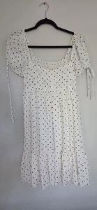 Sweet and swingy, this fully lined babydoll dress is pure polka dot-printed - Picture 1 of 6