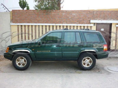 for:1993-1998 Jeep Grand Cherokee Stainless Fender Wheel Trim Molding 2" 4Pc - Image 1 of 3