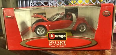 BURAGO 1/18 SCALE SMART ROADSTER RED #34099 DIAMOND COLLECTION DIE CAST ITALY - Image 1 of 4