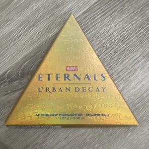 NEW IN BOX Urban Decay Marvel Eternals Afterglow Highlighter 0.08 oz. CUNEIRUNE - Picture 1 of 5