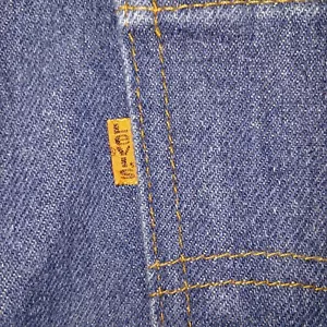 Pantalones de mezclilla vintage LEVIS 509 0917 para hombre 33x31 lavado regular naranja-pestaña años 80 - Imagen 1 de 16