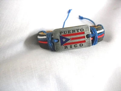 BLACK LEATHER PUERTO RICO METAL FLAG w TEXT & RED WHITE & BLUE CORD ADJ BRACELET - Image 1 of 2